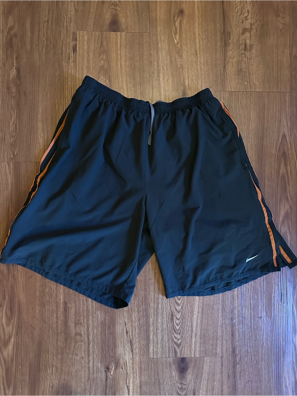 Nike Men’s Black Athletic Shorts with Orange Side Stripes